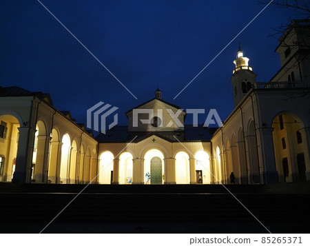 Night view of Madonna della Guardia votive offering sanctuary on Genoa mountain hill church 85265371
