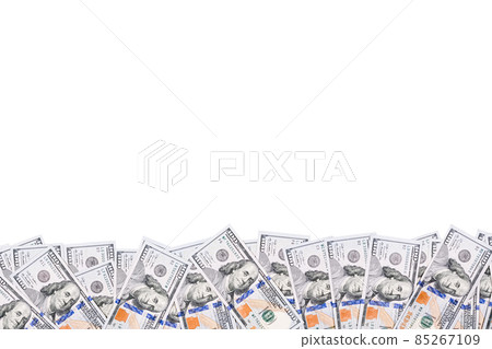 100 dollar bills wiggle on white background. Banner about money with copy space 100 dollar bills wiggle on white background. Banner about money with copy space 85267109