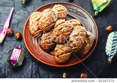 New Year treat, gingerbread cones. 85267378