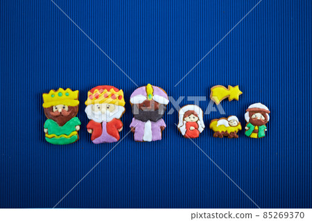 Happy Epiiphany day. Homemade cookies in the shape of the three wise men and Holy family. Happy Epiiphany day. Homemade cookies in the shape of the three wise men and Holy family. 85269370