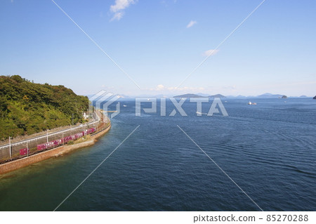 Sanyo Main Line freight train seen from Suo Bridge 85270288