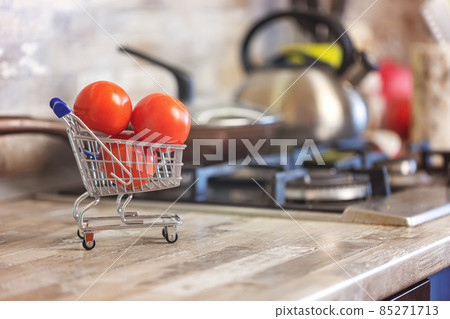 Concept: fast delivery of fresh vegetables from the store to your kitchen Concept: fast delivery of fresh vegetables from the store to your kitchen 85271713