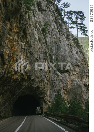 Empty route and small tunnel in mountain 85273955