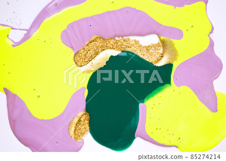 Mixture of acrylic bright paints with yellow gold glitter. Marble imitation background. 85274214