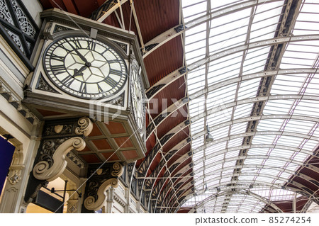 A large historic clock inside Paddington Station in London 85274254