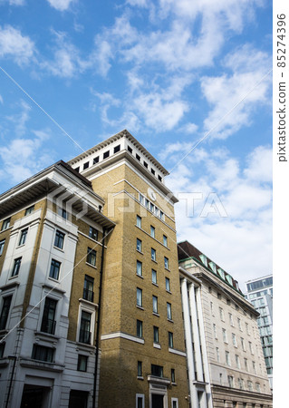 London skyline historic brick and stone buildings under the blue sky 85274396