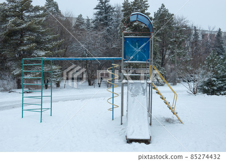 children's playground in the snow children's playground in the snow 85274432