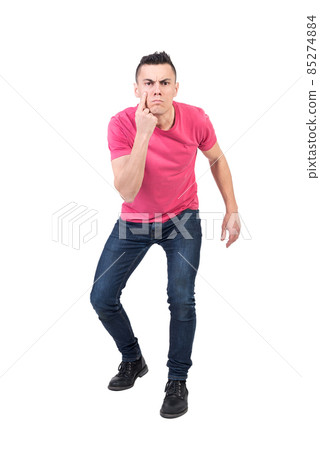 Serious man looking at camera. White background Serious man looking at camera. White background 85274884