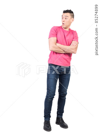 Astonished man with crossed arms. White background 85274899