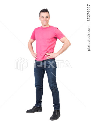 Cheerful man standing in studio. White background 85274927