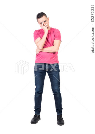 Tired man touching face and looking at camera 85275335