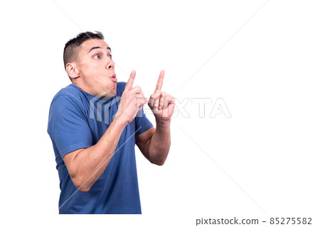 Profile of a surprised man pointing up with his fingers Profile of a surprised man pointing up with his fingers 85275582