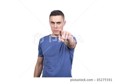 Caucasian man pointing forward with serious expression Caucasian man pointing forward with serious expression 85275591