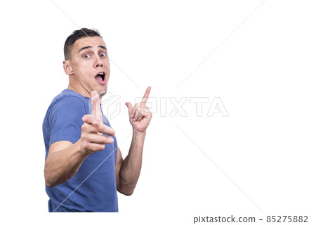 Man gesturing with his hands with a cocky expression Man gesturing with his hands with a cocky expression 85275882