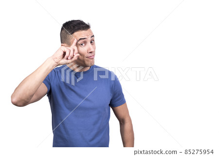 Man with his finger on his forehead gesturing he's thinking Man with his finger on his forehead gesturing he's thinking 85275954