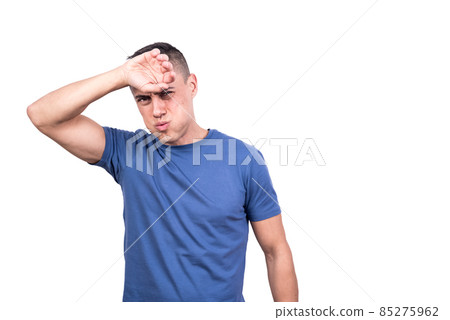 Man gesturing that he is hot with his arm Man gesturing that he is hot with his arm 85275962