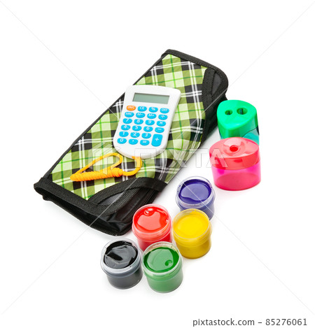 Set of gouache paints, sharpener and calculator isolated on white background. Set of gouache paints, sharpener and calculator isolated on white background. 85276061