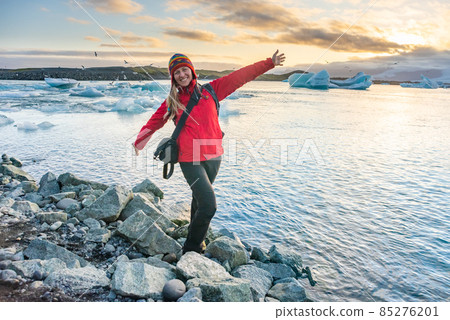 Sporty woman near Ice Glacier Jokulsarlon Lagoon, Iceland Sporty woman near Ice Glacier Jokulsarlon Lagoon, Iceland 85276201