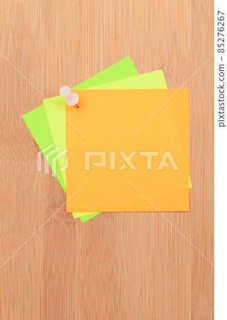 Colored Sticky Notes Pinned to the Wooden Message Board 85276267