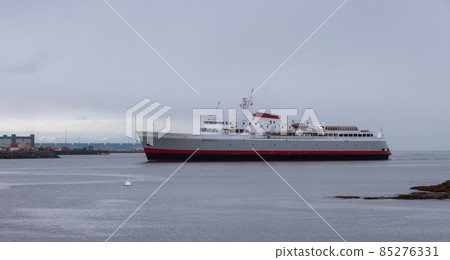 Ship arriving to Victoria Harbour during a rainy winter sunset Ship arriving to Victoria Harbour during a rainy winter sunset 85276331