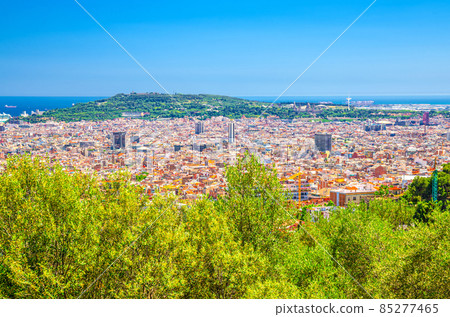 Aerial panoramic view of Barcelona city historical quarters districts with Montju c hill, Mediterranean Sea Aerial panoramic view of Barcelona city historical quarters districts with Montju c hill, Mediterranean Sea 85277465