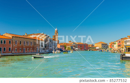 Murano islands with bridge across water canal, boats and motor boats 85277532