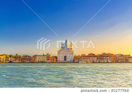 Chiesa del Santissimo Redentore catholic church and row of buildings on fondamenta embankment of Giudecca island Chiesa del Santissimo Redentore catholic church and row of buildings on fondamenta embankment of Giudecca island 85277568