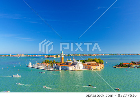 Aerial panoramic view of San Giorgio Maggiore island with Campanile San Giorgio in Venetian Lagoon 85277616