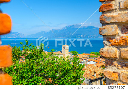 View of historical centre Desenzano del Garda old town with bell clock tower View of historical centre Desenzano del Garda old town with bell clock tower 85278107