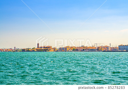 Panoramic view from sea lagoon of Chioggia town cityscape Panoramic view from sea lagoon of Chioggia town cityscape 85278283