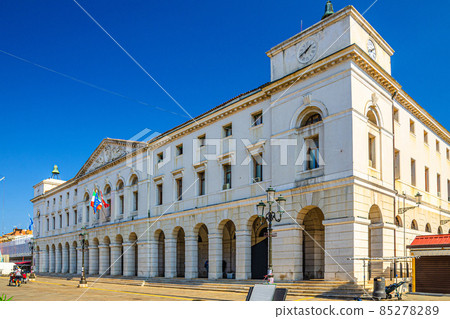 Chioggia town hall building in historical city centre, blue sky background 85278289
