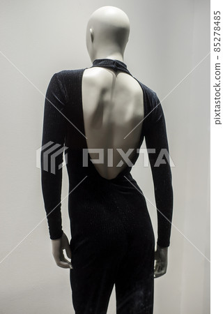 Closeup of black sexy clothes on manneqiun in a fashion store showroom Closeup of black sexy clothes on manneqiun in a fashion store showroom 85278485