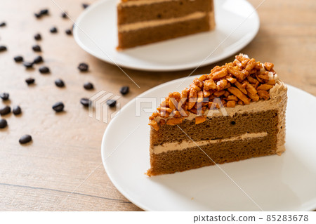 coffee almonds cake on plate 85283678