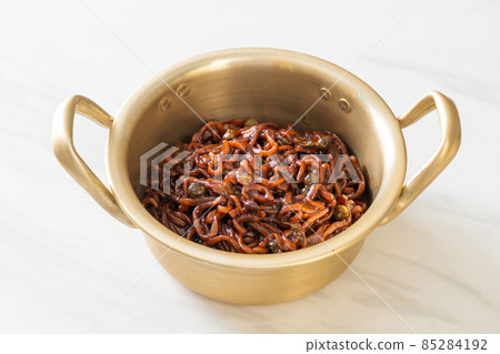 Korean black spaghetti or instant noodle with roasted chajung sauce Korean black spaghetti or instant noodle with roasted chajung sauce 85284192