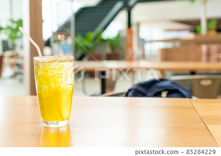 iced Chrysanthemum juice on wood table iced Chrysanthemum juice on wood table 85284229