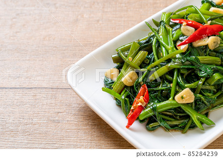 Stir-Fried Chinese Morning Glory or Water Spinach Stir-Fried Chinese Morning Glory or Water Spinach 85284239