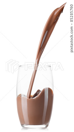 chocolate milk or cocoa drink pouring into glass chocolate milk or cocoa drink pouring into glass 85285760