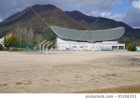 View of the building of Kitahiroshima Town Athletic Park in late autumn 85286391