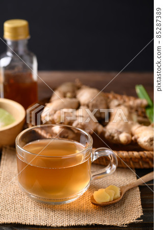 Ginger tea with lime and honey on wooden background, Healthy herbal drink Ginger tea with lime and honey on wooden background, Healthy herbal drink 85287389