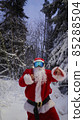 Santa Claus in a winter forest 85288504