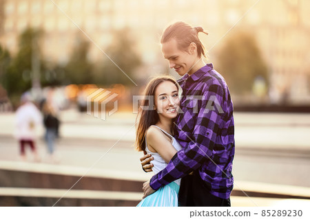 Date of happy young couple outdoors at summer. 85289230