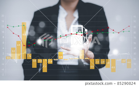 Oil energy graph of the world market, impact on the economy concept,Businesswoman touch chart with the indicator on the oil price slide at gas station, fluctuations in oil prices and exchange trade. 85290824