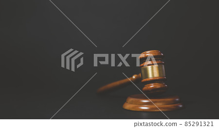 Old wood Judge hammer with law book on the table wood background, Used for adjudication and Justice. 85291321