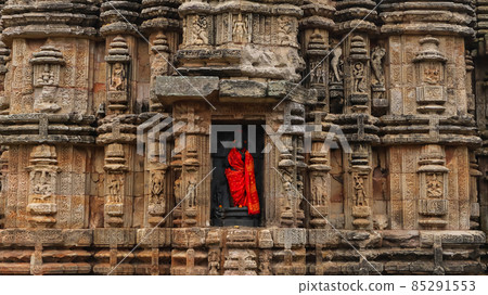 North facing statue of Goddess Parvati, Sukasari Temple, Bhubaneswar, Odisha, India. Built in sandstone with carvings of human figures, deities, scroll work and floral motifs on walls. 85291553