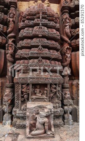 Stone carvings on the Vimana of Rajarani Temple. 11th century Odisha style temple constructed dull red and yellow sandstone, Bhubaneswar, Odisha, India. Stone carvings on the Vimana of Rajarani Temple. 11th century Odisha style temple constructed dull red and yellow sandstone, Bhubaneswar, Odisha, India. 85291570