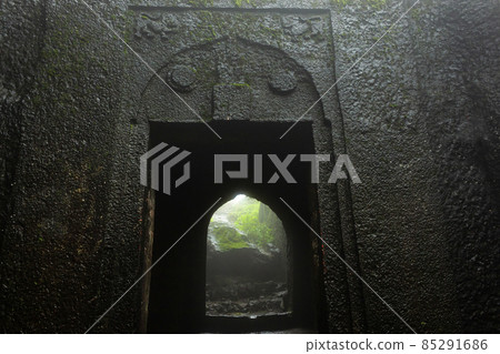 Western entrance gate of Tringalwadi fort, Nashik, Maharashtra, India. The steps and the entrance gate are carved from a single rock. Western entrance gate of Tringalwadi fort, Nashik, Maharashtra, India. The steps and the entrance gate are carved from a single rock. 85291686