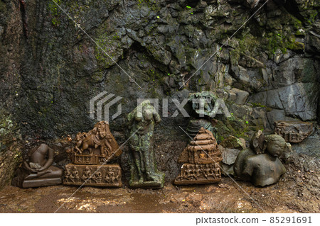 Old abandoned ruined statues of Tirthankar Adinath Jain caves, Tringalwadi fort, Nashik, Maharashtra, India. Old abandoned ruined statues of Tirthankar Adinath Jain caves, Tringalwadi fort, Nashik, Maharashtra, India. 85291691