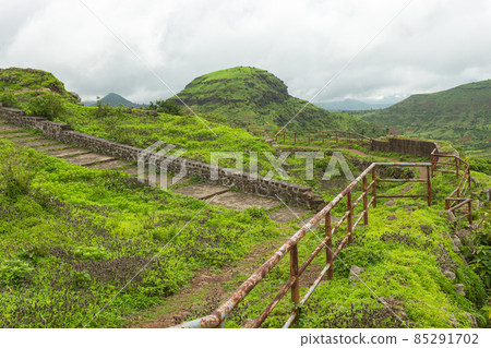 Walking stone pathway on the top of the Hatgad fort, Nashik, Maharashtra, India. Walking stone pathway on the top of the Hatgad fort, Nashik, Maharashtra, India. 85291702