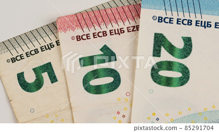 Close-up of five, ten and twenty euro bills. 85291704