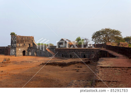 Ruined structures inside Jaigad Fort and protection wall, Konkan, Maharashtra, India. Ruined structures inside Jaigad Fort and protection wall, Konkan, Maharashtra, India. 85291783